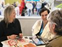 Sandra Permuy (izquierda) y Justo Ardá en sus encuentros en Fitur