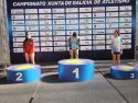 Irene García, en el centro, consiguió la mínima para el Campeonato de España 