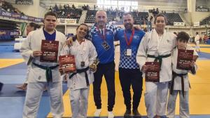 Alba Bollo, con sus compañeros infantiles y sus técnicos