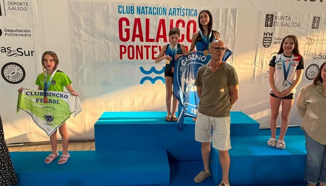Pico, a la izquierda, con su medalla