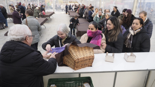 San Julián degustación arroz con leche en la plaza de Constitución